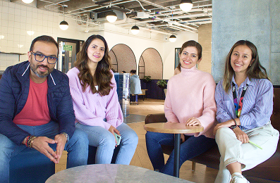 Offshore team members working together in Filta office