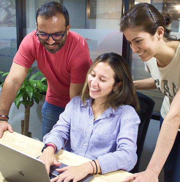 Professional offshore team member working on creative design projects in equipped office