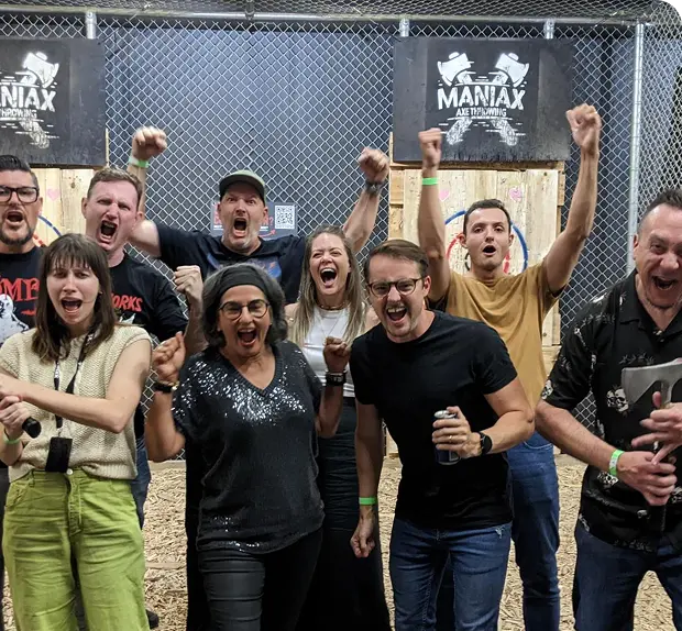 Advertising agency offshore team celebrating project success in Philippines